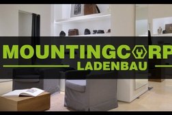 Mounting Corps Ladenbau GmbH Photo